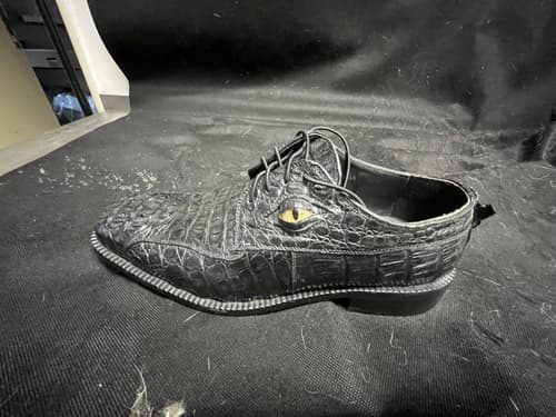 Bota z krokodýlí kůže. 